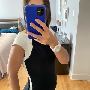 NWT Stunning sleeveless stretch top with faux leather accents